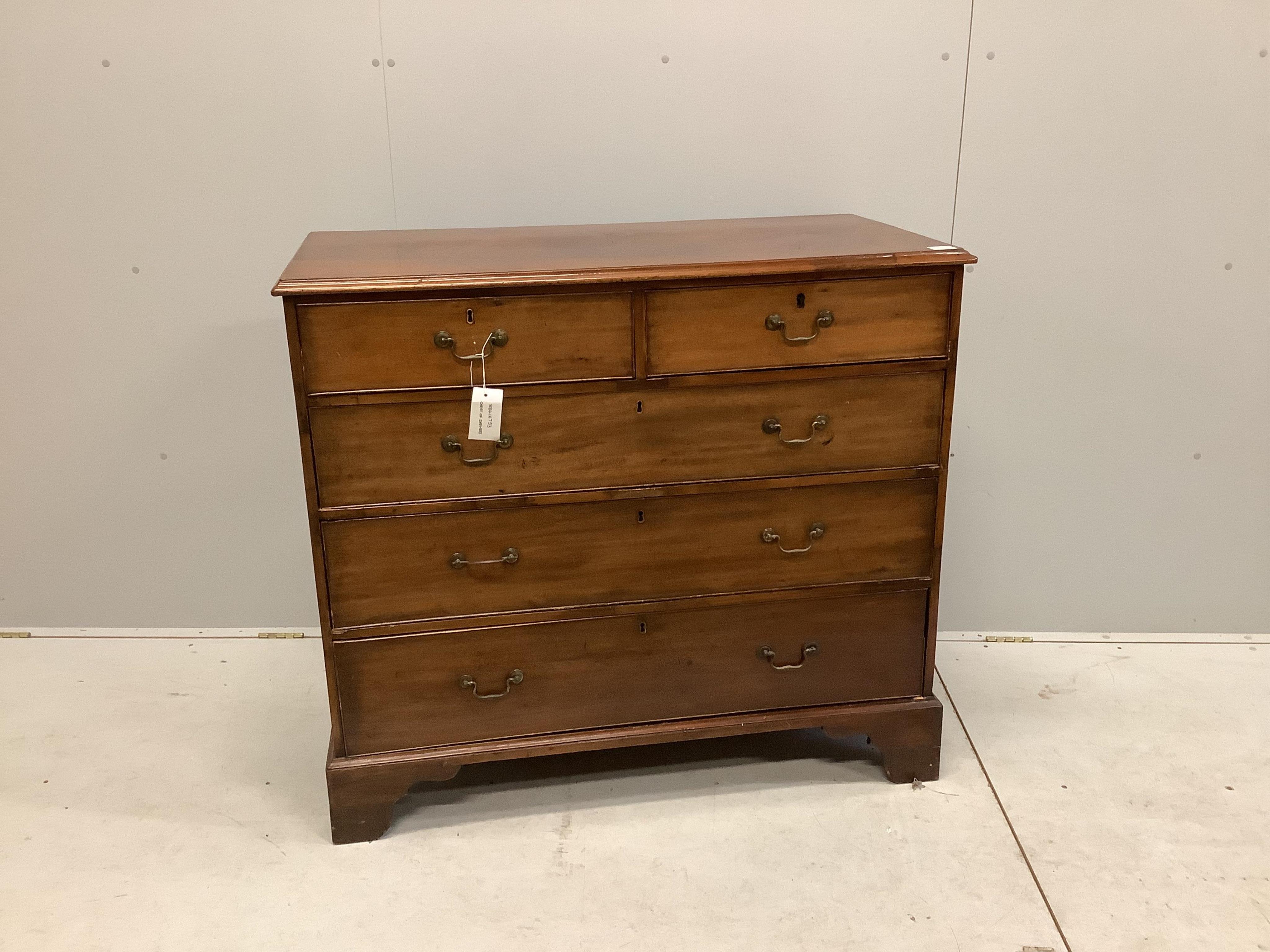 A George III mahogany chest of two short and three long drawers on bracket feet, width 114cm, depth 56cm, height 101cm. Condition - fair